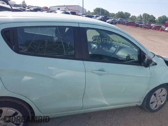 2018 Chevrolet Spark LS z VIN KL8CB6SA4JC452249, wystawiony jako IAAI lot #42547693 z przebiegiem 145 521 mil mil oraz . Historia ofert i sprzedaży dostępna na DreamBid. Obrazek 13.