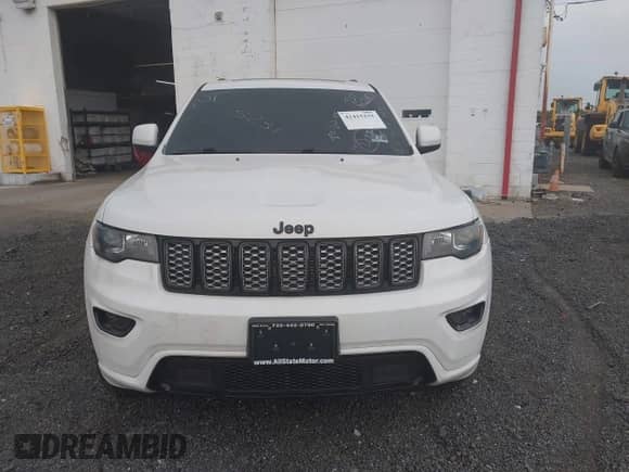 2020 Jeep Grand Cherokee Laredo E with VIN 1C4RJFAG5LC375033, listed as a IAAI auction lot 42415231 with 62,489 mi miles and . Bid and sale history available at DreamBid. Image 12.