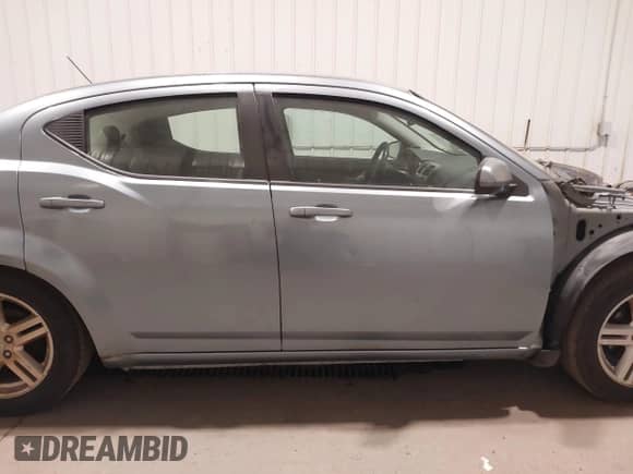 2010 Dodge Avenger R/T with VIN 1B3CC5FB2AN164818, listed as a IAAI auction lot 43230953 with 165,249 mi miles and . Bid and sale history available at DreamBid. Image 14.