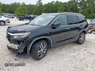 2016 Honda Pilot Touring с VIN 5FNYF5H96GB011386, выставлен на аукционе Copart как лот 67257255 с пробегом 168 895 миль миль и Списание • Salvage title. История ставок и продаж доступна на DreamBid. Изображение 1.