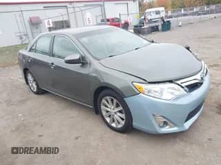 2012 Toyota Camry XLE z VIN 4T1BD1FK2CU016995, wystawiony jako IAAI lot #43390763 z przebiegiem 208 834 mil mil oraz . Historia ofert i sprzedaży dostępna na DreamBid. Obrazek 1.