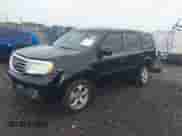 2014 Honda Pilot EX-L with VIN 5FNYF3H51EB001931, listed as a IAAI auction lot 42634856 with 211,271 mi miles and . Bid and sale history available at DreamBid. Image 23.