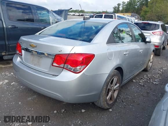 2015 Chevrolet Cruze LT with VIN 1G1PE5SB9F7200332, listed as a IAAI auction lot 43403040 with 154,776 mi miles and . Bid and sale history available at DreamBid. Image 4.