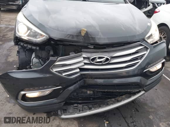 2018 Hyundai Santa Fe 2.0T with VIN 5XYZU4LA1JG529573, listed as a IAAI auction lot 43307903 with 83,585 mi miles and . Bid and sale history available at DreamBid. Image 6.