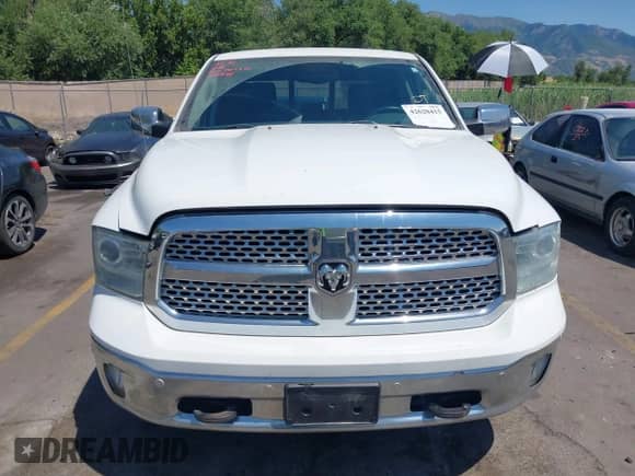 2014 Ram 1500 Laramie z VIN 1C6RR7VM1ES312946, wystawiony jako IAAI lot #42620415 z przebiegiem 163 405 mil mil oraz . Historia ofert i sprzedaży dostępna na DreamBid. Obrazek 12.