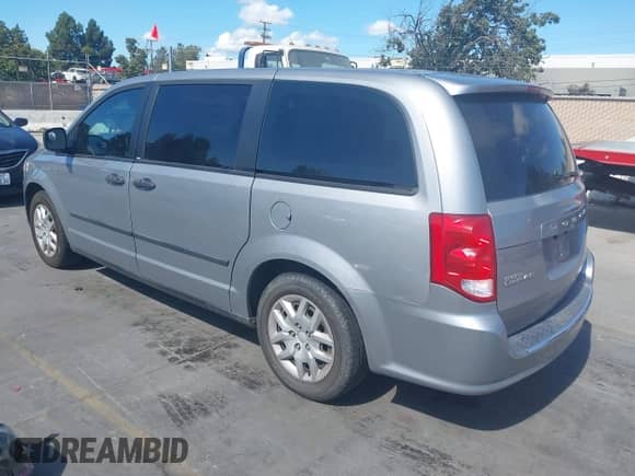 2013 Dodge Grand Caravan SE with VIN 2C4RDGBG5DR819855, listed as a IAAI auction lot 43183099 with 154,612 mi miles and . Bid and sale history available at DreamBid. Image 3.
