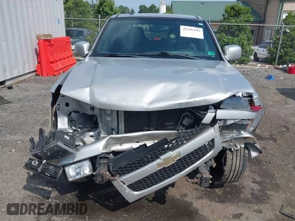 2011 Chevrolet Colorado 1LT z VIN 1GCHTCFEXB8131732, wystawiony jako IAAI lot #42595193 z przebiegiem 129 689 mil mil oraz . Historia ofert i sprzedaży dostępna na DreamBid. Obrazek 6.