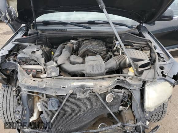 2012 Jeep Grand Cherokee Laredo z VIN 1C4RJEAG0CC307054, wystawiony jako Copart lot #81123575 z przebiegiem 304 057 mil mil oraz Czysty tytuł • Clean title. Historia ofert i sprzedaży dostępna na DreamBid. Obrazek 11.