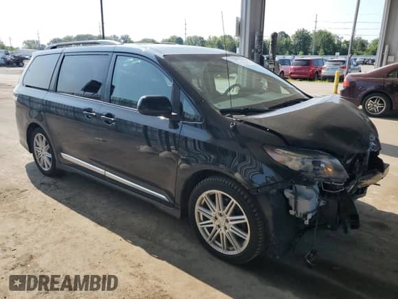 2012 Toyota Sienna SE with VIN 5TDXK3DC7CS206626, listed as a Copart auction lot 69088265 with 139,404 mi miles and Salvage title. Bid and sale history available at DreamBid. Image 4.