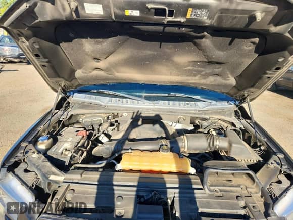 2017 Ford F-150 Lariat with VIN 1FTEW1EG2HKD56479, listed as a Copart auction lot 82677235 with 90,810 mi miles and Salvage title. Bid and sale history available at DreamBid. Image 11.