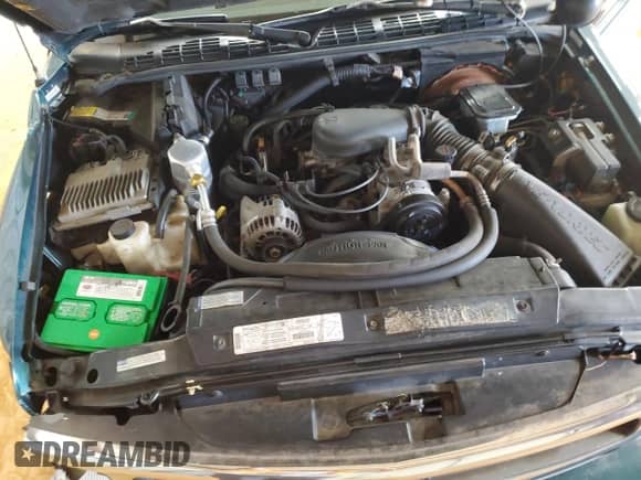 1997 Chevrolet Blazer LS with VIN 1GNDT13W3V2227216, listed as a Copart auction lot 80871195 with 152,294 mi miles and Salvage title. Bid and sale history available at DreamBid. Image 12.