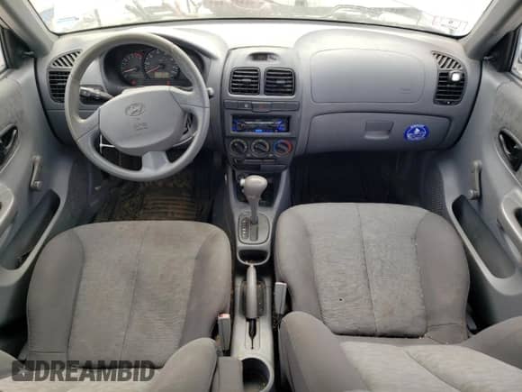 2005 Hyundai Accent GLS z VIN KMHCG45C25U603157, wystawiony jako Copart lot #71985824 z przebiegiem 110 124 mil mil oraz Czysty tytuł • Clean title. Historia ofert i sprzedaży dostępna na DreamBid. Obrazek 8.