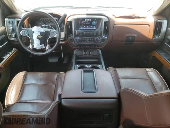 2015 Chevrolet Silverado 2500HD High Country с VIN 1GC1KXEG1FF620567, выставлен на аукционе Copart как лот 59094405 с пробегом 75 143 миль миль и Списание • Salvage title. История ставок и продаж доступна на DreamBid. Изображение 8.