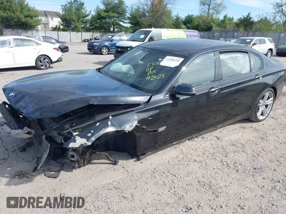 2015 BMW 7 Series with VIN WBAYG6C59FD383735, listed as a IAAI auction lot 42106255 with 107,936 mi miles and . Bid and sale history available at DreamBid. Image 2.