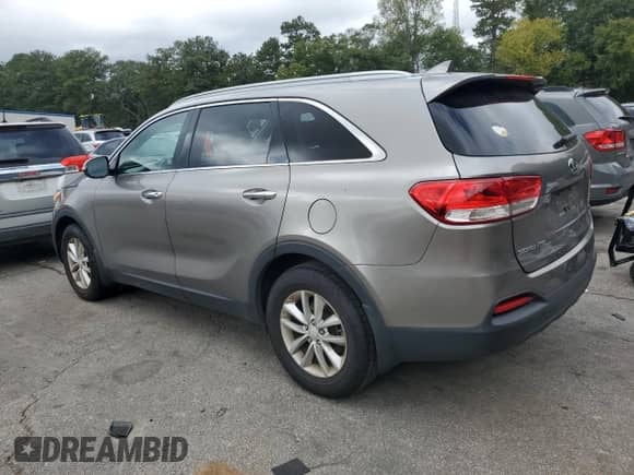 2016 Kia Sorento LX with VIN 5XYPG4A36GG076787, listed as a Copart auction lot 82225895 with 167,301 mi miles and Clean title. Bid and sale history available at DreamBid. Image 2.