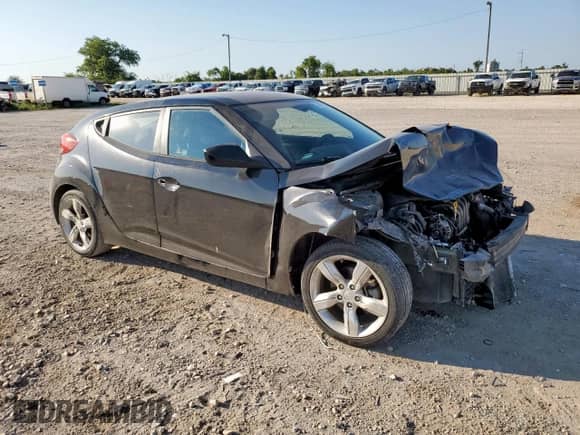 2015 Hyundai Veloster z VIN KMHTC6AD4FU245065, wystawiony jako Copart lot #68655815 z przebiegiem 120 922 mil mil oraz Szkoda całkowita • Salvage title. Historia ofert i sprzedaży dostępna na DreamBid. Obrazek 4.