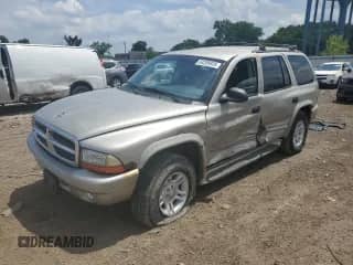 2001 Dodge Durango with VIN 1B4HS28N21F620093, listed as a Copart auction lot 64295925 with 144,498 mi miles and Salvage title. Bid and sale history available at DreamBid. Image 1.