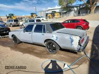 1983 Chevrolet Caprice с VIN 1G1AN69H6DX155174, выставлен на аукционе Copart как лот 80213775 с пробегом 19 781 миль миль и Списание • Salvage title. История ставок и продаж доступна на DreamBid. Изображение 2.