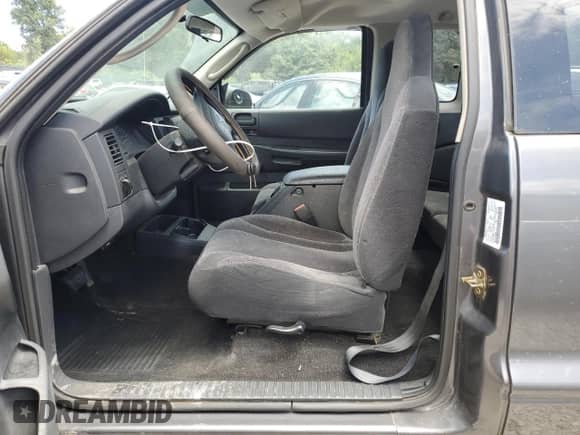 2003 Dodge Dakota с VIN 1D7HL12X93S188638, выставлен на аукционе Copart как лот 65231685 с пробегом 102 617 миль миль и Списание • Salvage title. История ставок и продаж доступна на DreamBid. Изображение 7.