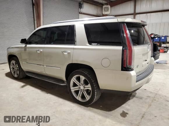 2015 Cadillac Escalade z VIN 1GYS4AKJ1FR100437, wystawiony jako Copart lot #44642635 z przebiegiem 51 581 mil mil oraz Czysty tytuł • Clean title. Historia ofert i sprzedaży dostępna na DreamBid. Obrazek 2.
