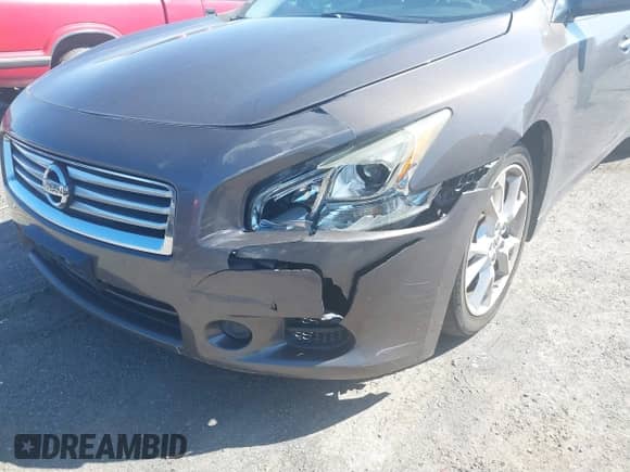 2013 Nissan Maxima SV z VIN 1N4AA5AP0DC808692, wystawiony jako IAAI lot #41748284 z przebiegiem 123 479 mil mil oraz . Historia ofert i sprzedaży dostępna na DreamBid. Obrazek 6.