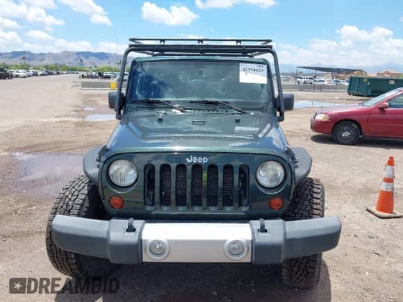 2012 Jeep Wrangler Sahara с VIN 1C4AJWBGXCL100527, выставлен на аукционе IAAI как лот 42394623 с пробегом 126 097 миль миль и . История ставок и продаж доступна на DreamBid. Изображение 12.