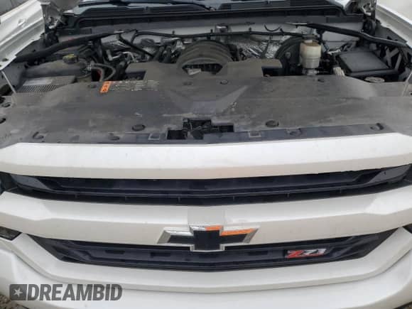 2017 Chevrolet Silverado 1500 LT z VIN 3GCUKREC0HG506938, wystawiony jako Copart lot #80619094 z przebiegiem 73 332 mil mil oraz Szkoda całkowita • Salvage title. Historia ofert i sprzedaży dostępna na DreamBid. Obrazek 11.