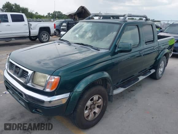 2000 Nissan Frontier XE with VIN 1N6ED27T1YC392998, listed as a IAAI auction lot 43030074 with 195,913 mi miles and . Bid and sale history available at DreamBid. Image 2.
