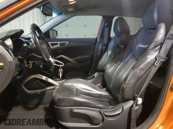 2014 Hyundai Veloster z VIN KMHTC6AD4EU212324, wystawiony jako Copart lot #71514455 z przebiegiem 120 419 mil mil oraz Czysty tytuł • Clean title. Historia ofert i sprzedaży dostępna na DreamBid. Obrazek 7.