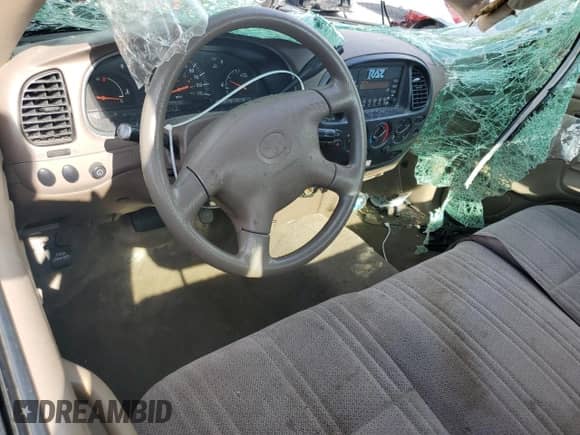 2002 Toyota Tundra z VIN 5TBJN32112S308395, wystawiony jako Copart lot #69652885 z przebiegiem 109 853 mil mil oraz Szkoda całkowita • Salvage title. Historia ofert i sprzedaży dostępna na DreamBid. Obrazek 8.