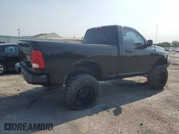 2012 Ram 1500 Express z VIN 3C6JD7AT9CG157060, wystawiony jako Copart lot #64777895 z przebiegiem 142 102 mil mil oraz Szkoda całkowita • Salvage title. Historia ofert i sprzedaży dostępna na DreamBid. Obrazek 3.