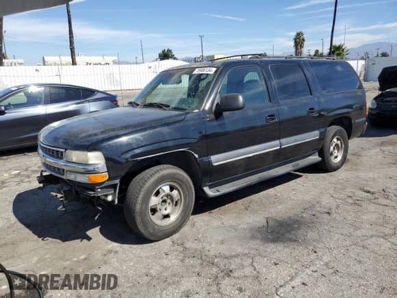 2002 Chevrolet Suburban LT with VIN 3GNEC16T42G174731, listed as a Copart auction lot 75906134 with Not provided miles and Salvage title. Bid and sale history available at DreamBid. Image 1.