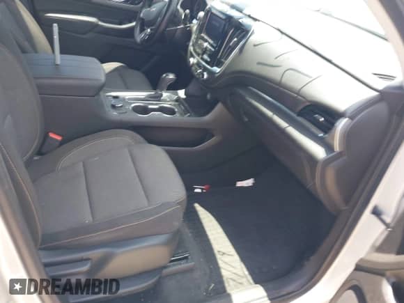2020 Chevrolet Traverse LS with VIN 1GNERFKW3LJ298789, listed as a IAAI auction lot 42803638 with 72,671 mi miles and . Bid and sale history available at DreamBid. Image 5.