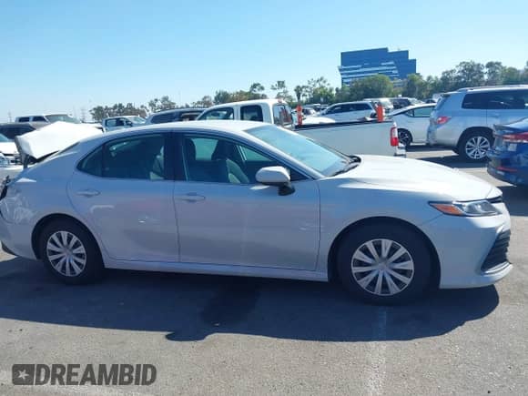 2022 Toyota Camry Hybrid LE with VIN 4T1C31AK1NU036253, listed as a IAAI auction lot 43313594 with 37,078 mi miles and . Bid and sale history available at DreamBid. Image 13.