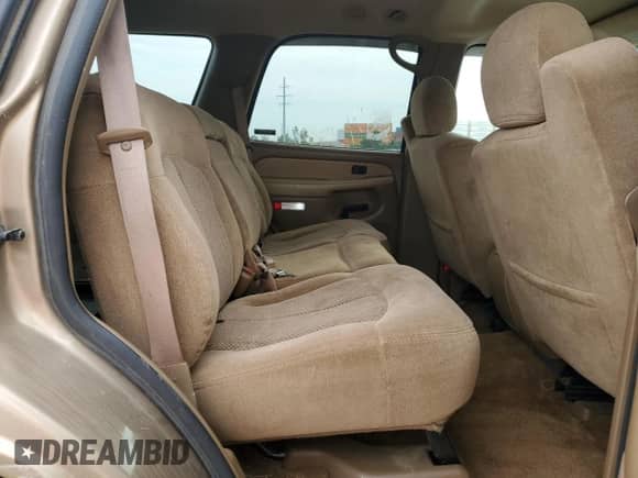 2000 Chevrolet Tahoe LT z VIN 1GNEK13T2YJ130774, wystawiony jako Copart lot #64125235 z przebiegiem 210 024 mil mil oraz Czysty tytuł • Clean title. Historia ofert i sprzedaży dostępna na DreamBid. Obrazek 11.