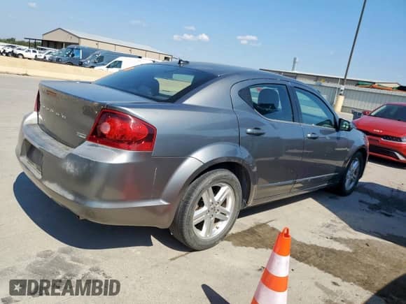 2013 Dodge Avenger SXT with VIN 1C3CDZCGXDN682123, listed as a Copart auction lot 81931835 with 144,236 mi miles and Salvage title. Bid and sale history available at DreamBid. Image 3.