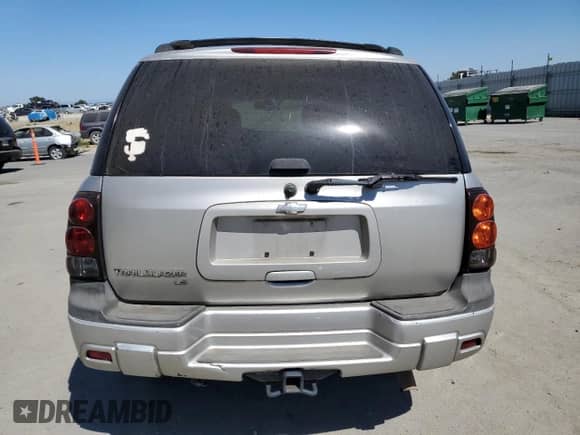 2005 Chevrolet TrailBlazer LS с VIN 1GNDS13S552166404, выставлен на аукционе Copart как лот 68383055 с пробегом 191 128 миль миль и Списание • Salvage title. История ставок и продаж доступна на DreamBid. Изображение 6.