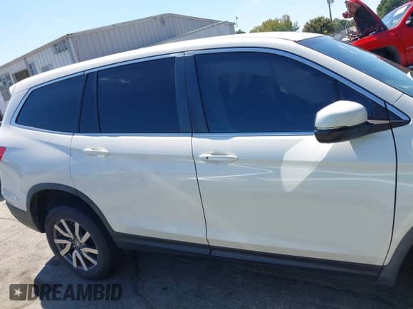 2019 Honda Pilot EX with VIN 5FNYF6H33KB062693, listed as a IAAI auction lot 43167488 with 96,858 mi miles and . Bid and sale history available at DreamBid. Image 13.
