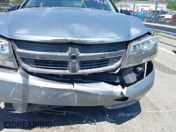 2009 Dodge Avenger SE with VIN 1B3LC46B59N569481, listed as a IAAI auction lot 42543825 with 182,158 mi miles and . Bid and sale history available at DreamBid. Image 6.