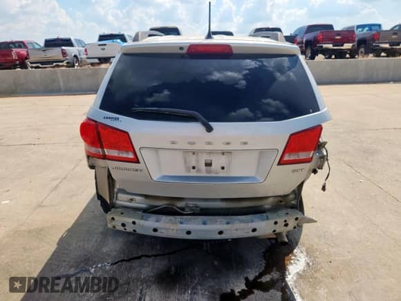 2013 Dodge Journey SXT с VIN 3C4PDCBB4DT565797, выставлен на аукционе Copart как лот 85310185 с пробегом 163 544 миль миль и Списание • Salvage title. История ставок и продаж доступна на DreamBid. Изображение 6.