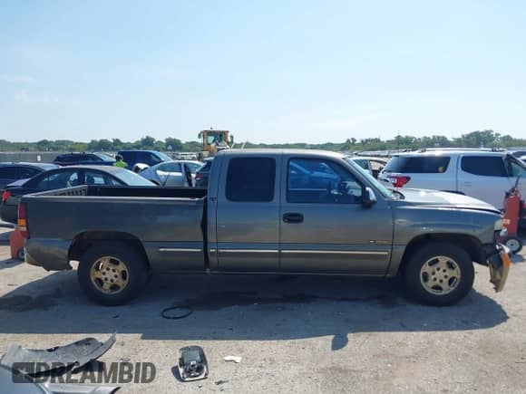 1999 Chevrolet Silverado 1500 LS z VIN 2GCEC19T4X1253725, wystawiony jako IAAI lot #43033823 z przebiegiem 381 140 mil mil oraz . Historia ofert i sprzedaży dostępna na DreamBid. Obrazek 13.