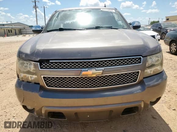 2011 Chevrolet Suburban LT с VIN 1GNSCJE05BR142137, выставлен на аукционе Copart как лот 62715655 с пробегом 217 315 миль миль и Списание • Salvage title. История ставок и продаж доступна на DreamBid. Изображение 5.