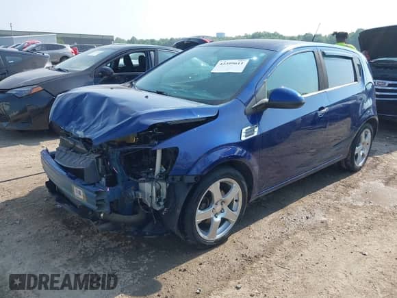 2014 Chevrolet Sonic LTZ with VIN 1G1JE6SB4E4226395, listed as a IAAI auction lot 42399611 with 150,847 mi miles and . Bid and sale history available at DreamBid. Image 2.