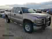 2001 Chevrolet Silverado 2500HD LS z VIN 1GCHK29121E196239, wystawiony jako Copart lot #86506404 z przebiegiem 165 759 mil mil oraz Szkoda całkowita • Salvage title. Historia ofert i sprzedaży dostępna na DreamBid. Obrazek 4.