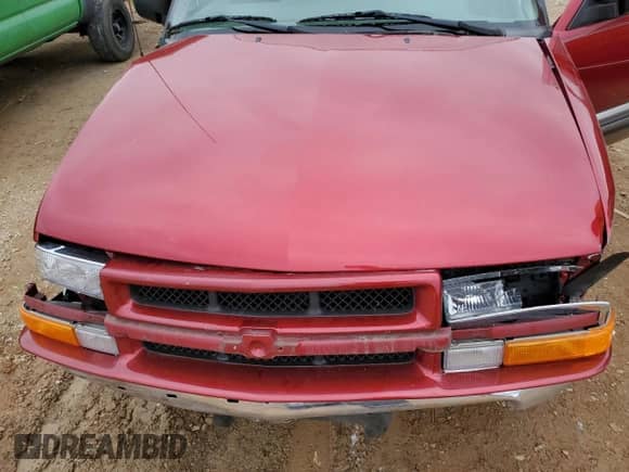 2000 Chevrolet Blazer LT with VIN 1GNCS13W3Y2213772, listed as a Copart auction lot 79964794 with 80,090 mi miles and Salvage title. Bid and sale history available at DreamBid. Image 12.