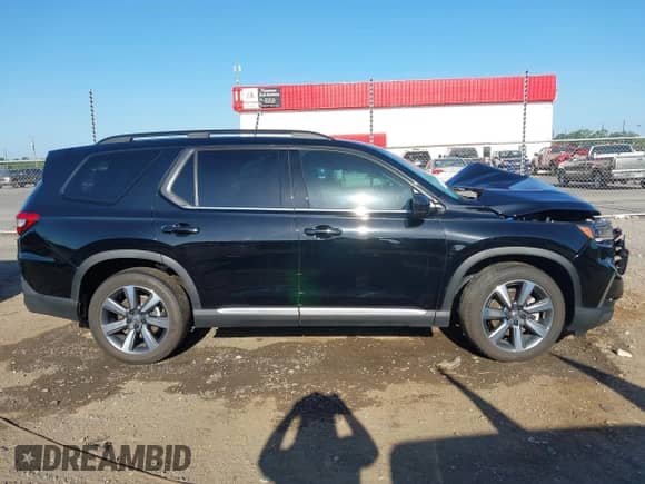 2025 Honda Pilot Elite z VIN 5FNYG1H88SB026591, wystawiony jako IAAI lot #42845720 z przebiegiem 7 853 mil mil oraz . Historia ofert i sprzedaży dostępna na DreamBid. Obrazek 14.