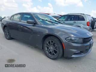 2018 Dodge Charger GT with VIN 2C3CDXJG7JH216399, listed as a IAAI auction lot 42661831 with 110,990 mi miles and . Bid and sale history available at DreamBid. Image 1.