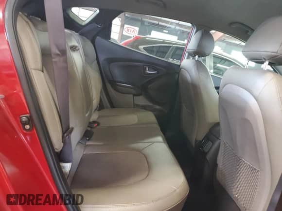 2015 Hyundai Tucson SE z VIN KM8JUCAG6FU974956, wystawiony jako Copart lot #69148475 z przebiegiem 99 898 mil mil oraz Czysty tytuł • Clean title. Historia ofert i sprzedaży dostępna na DreamBid. Obrazek 11.