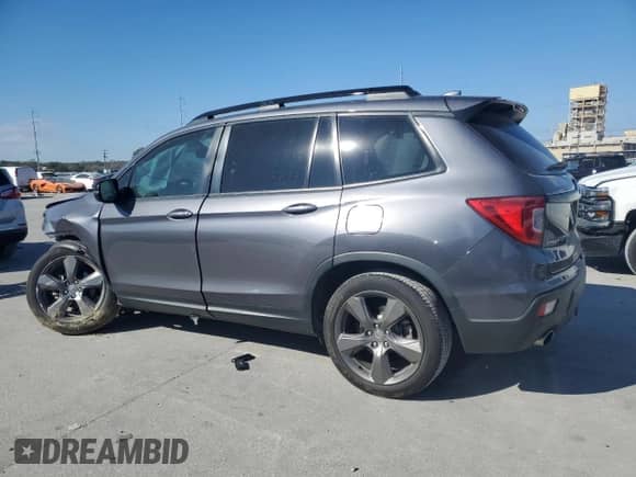 2021 Honda Passport Touring с VIN 5FNYF7H94MB001771, выставлен на аукционе Copart как лот 85773354 с пробегом Не указан миль и Списание • Salvage title. История ставок и продаж доступна на DreamBid. Изображение 2.