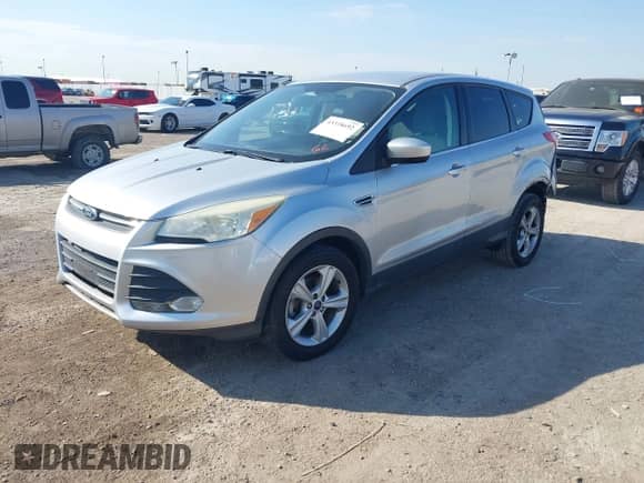 2014 Ford Escape SE with VIN 1FMCU0GX7EUA37725, listed as a IAAI auction lot 43318692 with 157,118 mi miles and . Bid and sale history available at DreamBid. Image 2.